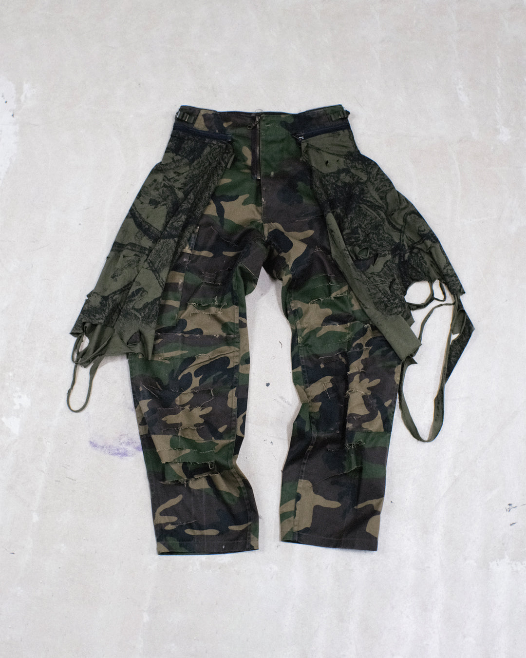 SLICED CAMO TROUSERS