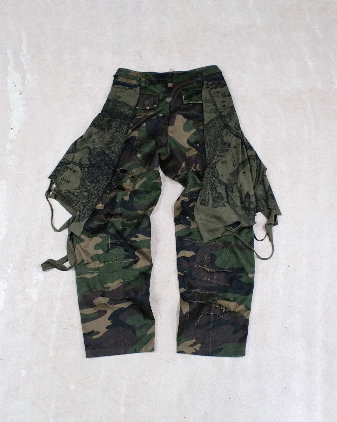 SLICED CAMO TROUSERS